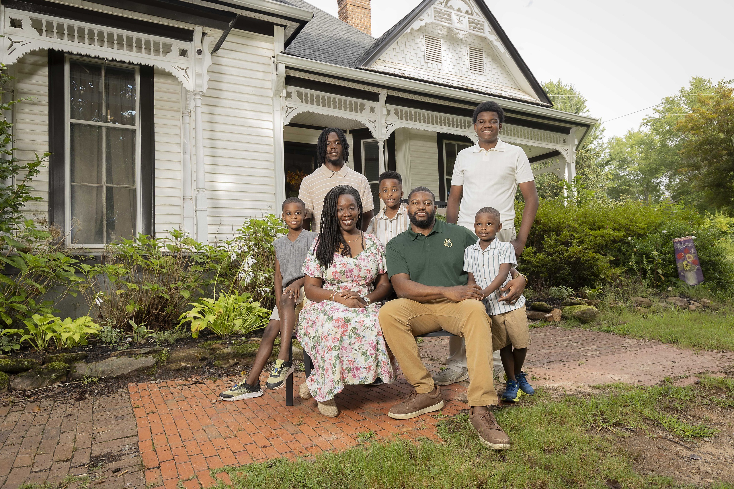An Oasis of Healing - Bonds family portrait in front of the Victorian farmhouse